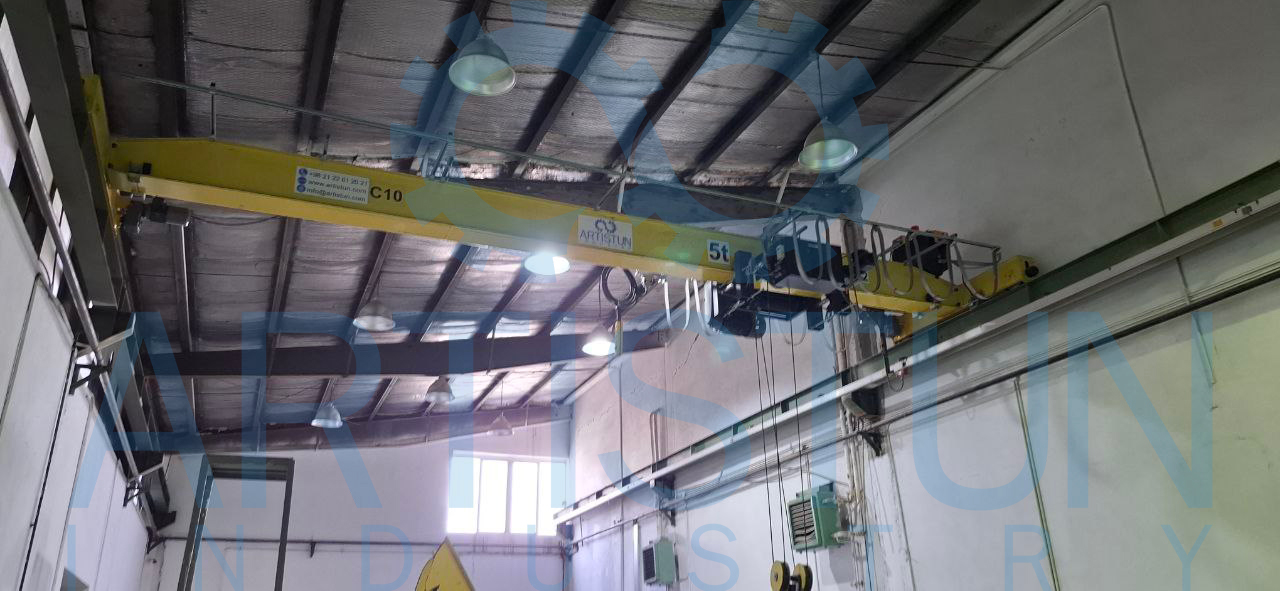 Detail view of the electric wire rope hoist on the single girder overhead crane